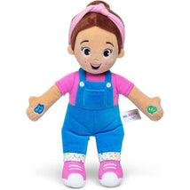 Ms. Rachel Speak N Sing Doll features a smiling character with brown hair, wearing a pink shirt, blue overalls, and pink shoes.