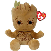 Soft plush toy of Groot from Guardians of the Galaxy, featuring large eyes, a smiling face, and a small leaf on top.