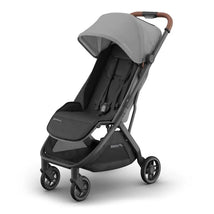 Uppababy Minu V3 Compact Stroller in Greyson, featuring a charcoal mélange fabric, carbon frame, and saddle leather handle.
