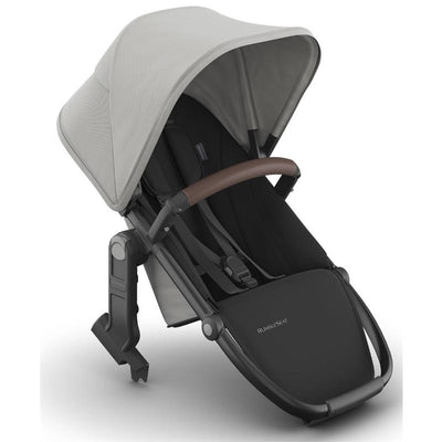 Uppababy Rumbleseat V3 in Pearl Gray Jacquard with a carbon frame and chestnut leather handle, designed for child seating.