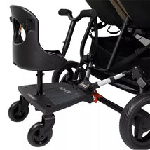 Universal stroller attachment for children featuring a seat and sturdy wheelbase, designed for use with Valco Baby strollers.
