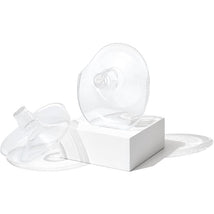 Two clear plastic flanges for breast pumps, designed for use with the Willow brand, displayed on a white pedestal.