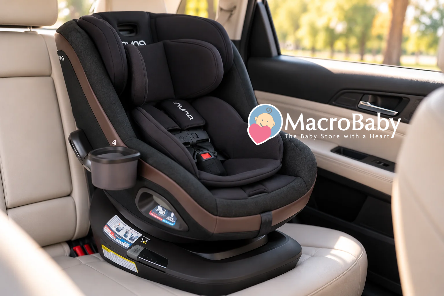 Nuna car seat installed in a car with beige leather seats.