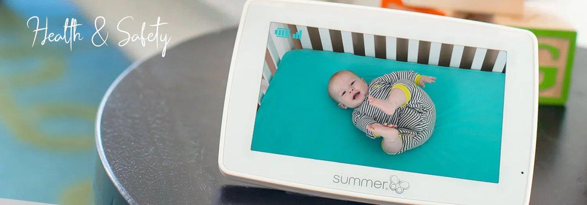 Baby health and safety essentials including monitor, thermometer, and grooming set