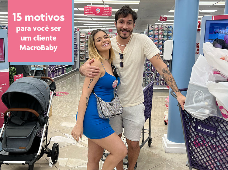 Happy couple shopping with baby stroller and cart at MacroBaby store