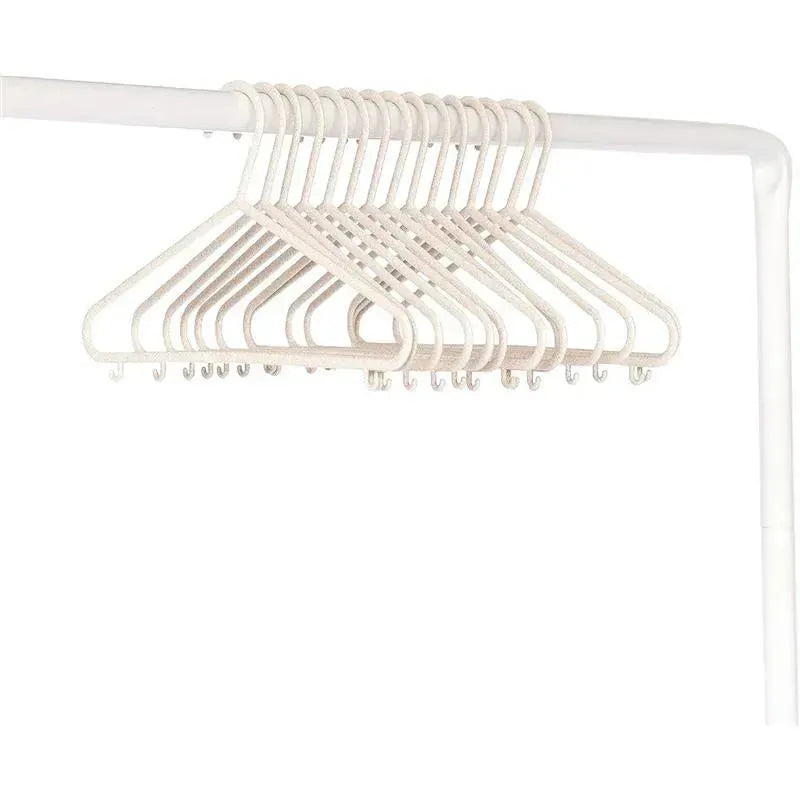 15 pack of speckled cream baby hangers displayed on a white rod, designed for clothing organization.