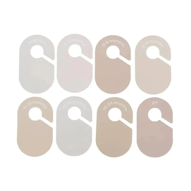 Set of 8 neutral closet dividers for baby and toddler clothing, labeled for sizes 3-6 months to 2T.