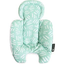 Reversible newborn insert in mint green with white pattern, designed for comfort in baby carriers.