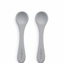 Two Primo Passi silicone baby spoons in senior grey