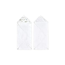 Hooded baby bath towels featuring dino jungle print, soft white material, and triangular hoods for warmth.
