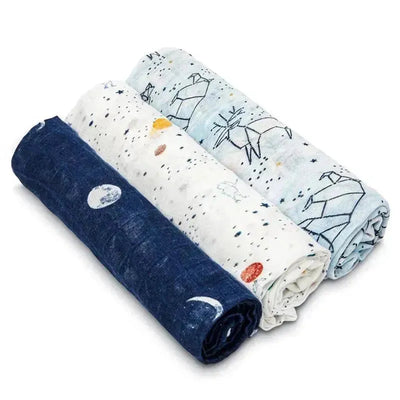Three Aden + Anais silky soft swaddles featuring starry designs, including planets and animals in a stargaze theme.