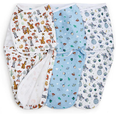 Three swaddle wraps featuring Toy Story characters, designed with bottom zippers for quick changes.