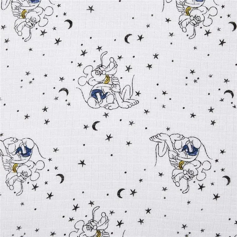 Muslin swaddle featuring playful Mickey Mouse designs against a starry night background with crescent moons.