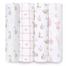 Four Aden + Anais muslin swaddle blankets featuring various patterns: geese, a pink grid, floral designs, and soft botanical illustrations.