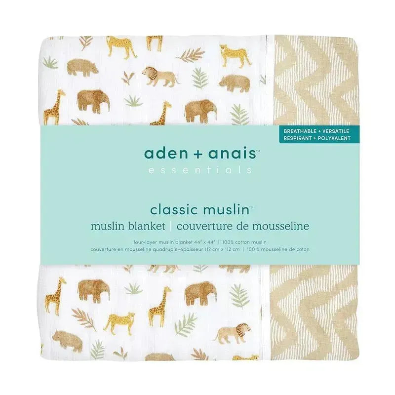 Muslin blanket featuring a Tanzania-Great Migration design with various animals and foliage, labeled by aden + anais.