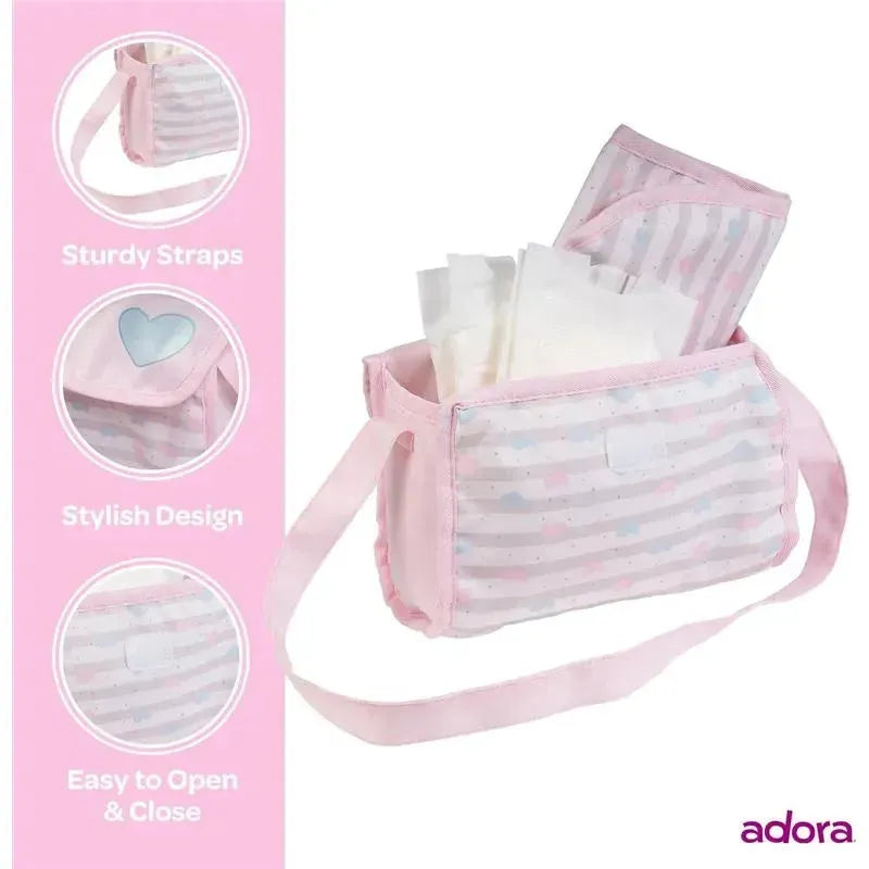 Adora Baby Doll Diaper Bag in pastel pink with sturdy straps, featuring a changing mat and two doll diapers.