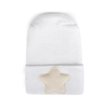 Cream linen hospital hat with a folded cuff and a soft star patch on the front. Ideal for newborns.
