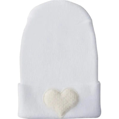 Newborn baby hospital hat in fuzzy ivory with a soft heart design, ideal for keeping infants warm.