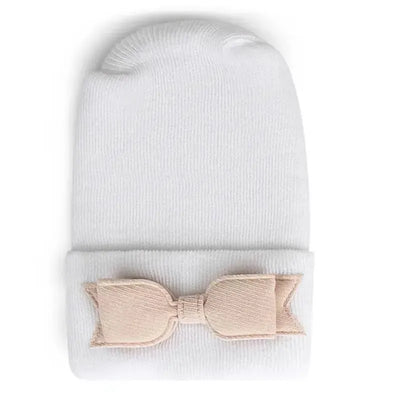 Newborn hospital hat in white with a soft, petal bow detail at the base. Ideal gift for baby girls.