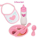 Adora Magic Feeding Set includes a pink bib, bottle, divided plate, fork, and spoon for role-play feeding fun.