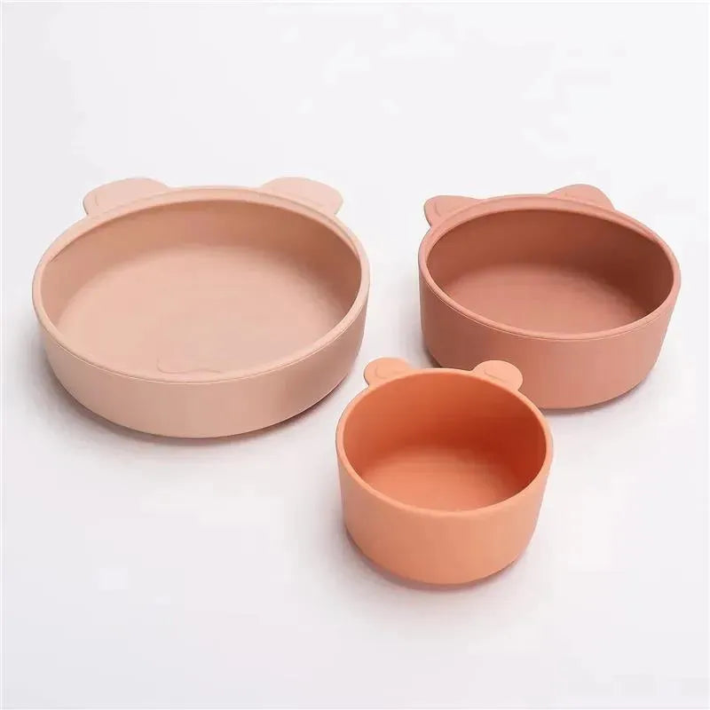 Stackable snack bowl set in terracotta blush, featuring three bowls with cute bear-ear shapes in varying sizes.