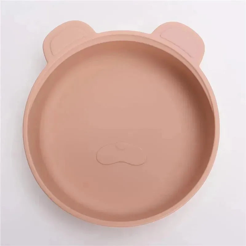 Stackable snack bowl in terracotta blush color, featuring a cute bear face design with rounded ears and a smooth interior.