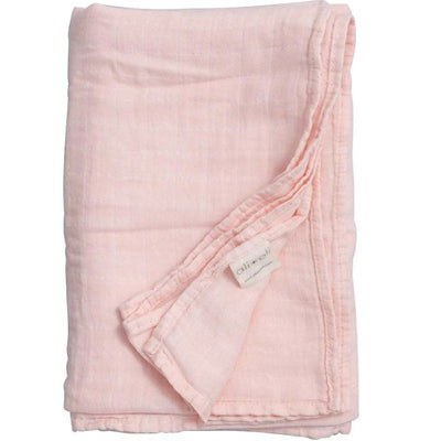 Soft pink Ali+Oli muslin swaddle blanket folded, featuring a stitched edge and a tag with the brand name.