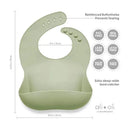 Light sage silicone baby bib with reinforced buttonholes and a deep food catcher, featuring safety certifications.