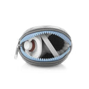 Grey Ali+Oli silicone pacifier case with a blue zipper containing a white pacifier inside.