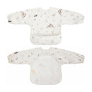 Long-sleeve smock bib for babies and toddlers featuring woodland animal prints and a large front pocket.
