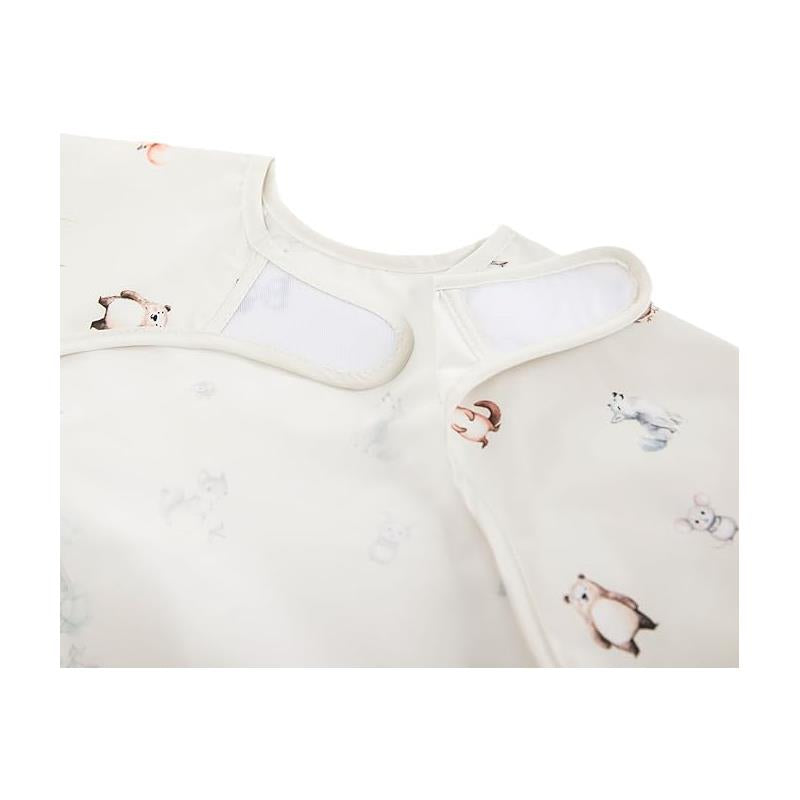 Long sleeve smock bib for babies and toddlers featuring a woodland animal print.