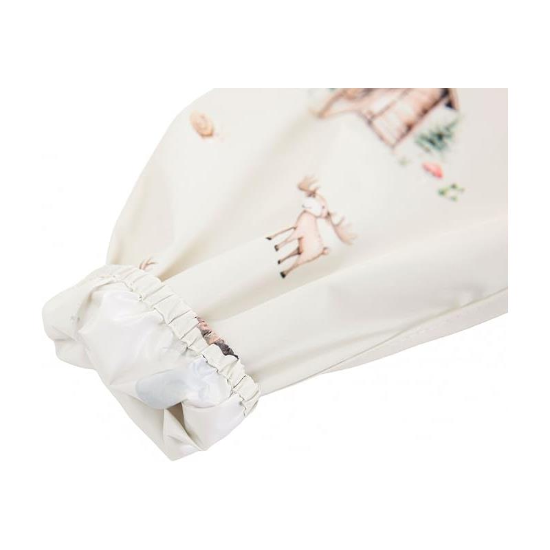 Long-sleeve smock bib for babies and toddlers featuring a woodland-themed print with animals and nature motifs.