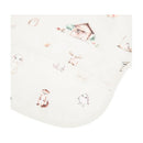 Smock bib for babies and toddlers featuring a woodland animal print with illustrations of a house and various cute animals.