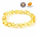 Amber Stone Baroque Baltic Amber Bracelet featuring rounded and oval amber beads in warm yellow tones.