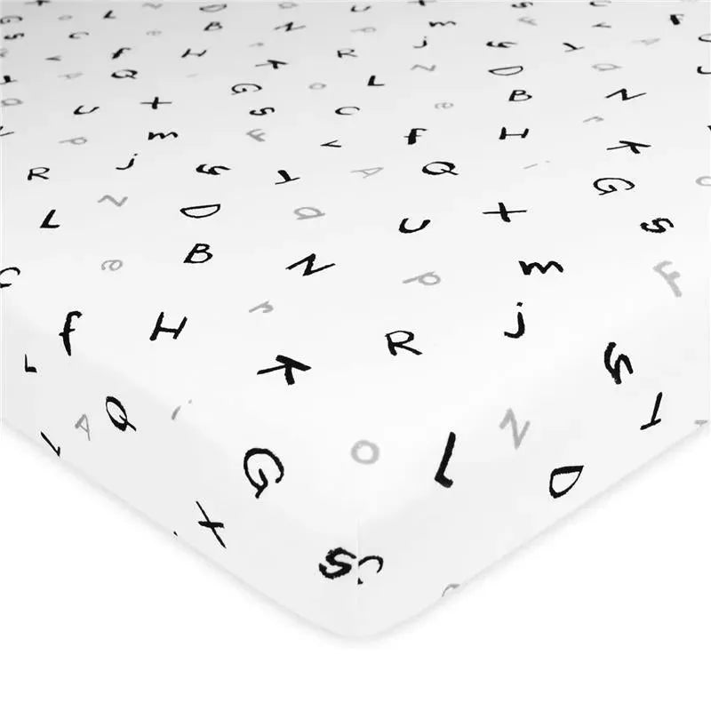 Grey bassinet sheet featuring a playful design of black and grey alphabet letters on a white background.