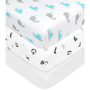 Grey bassinet sheets featuring playful whale and alphabet patterns, made of 100% cotton jersey.
