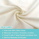 Cream-colored fitted bassinet sheet made from 100% natural cotton jersey knit, shown with features listed below.