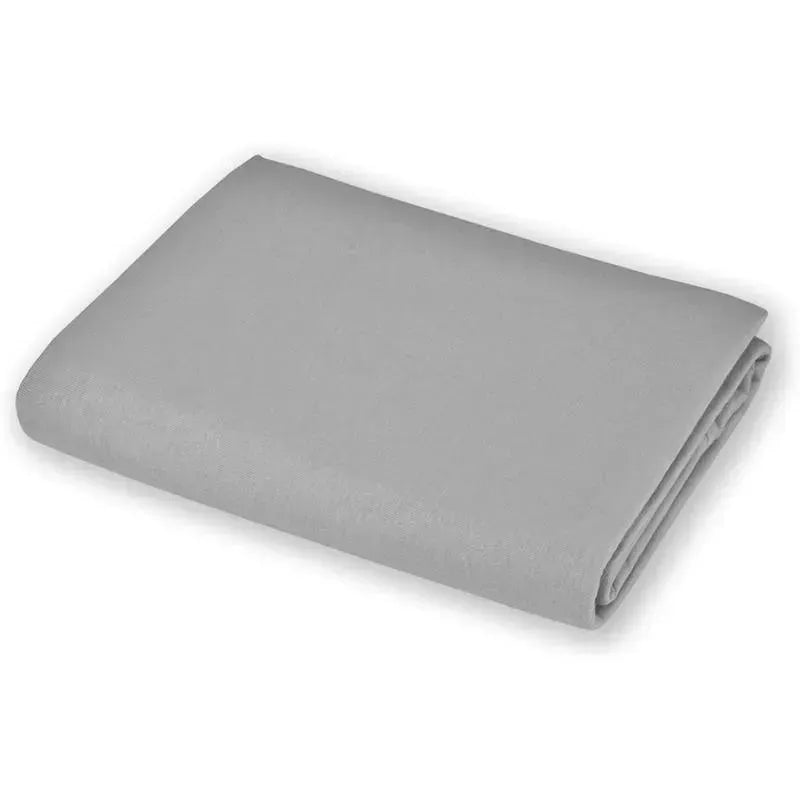 Fitted bassinet sheet made of 100% natural cotton jersey knit in grey, folded neatly.