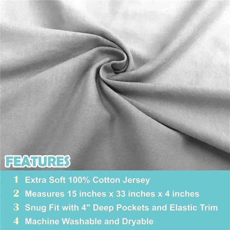 Grey 100% cotton jersey knit bassinet sheet with deep pockets and elastic trim, displaying product features.