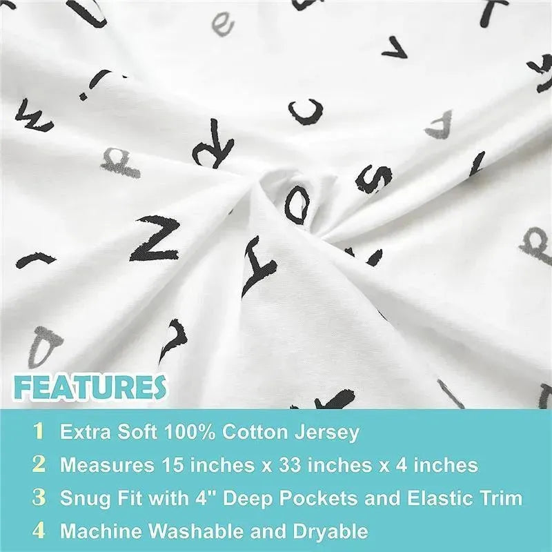 Fitted bassinet sheet made from 100% cotton jersey knit, featuring a playful alphabet print on a white background.