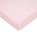 Fitted mini crib sheet in baby pink, made of 100% cotton jersey, designed for portable cribs measuring 24 x 38 inches.