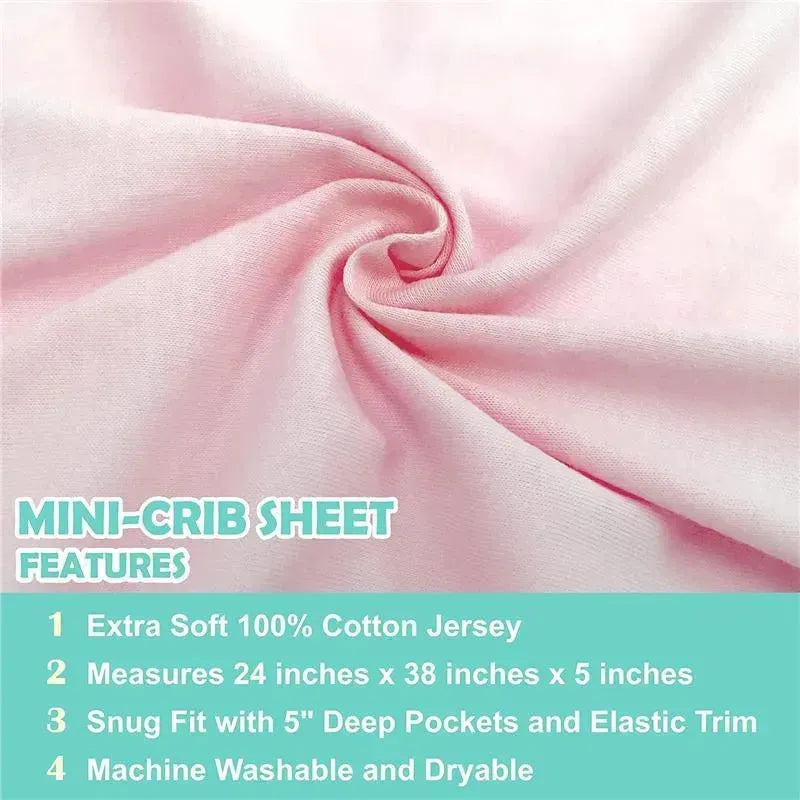 Fitted mini crib sheet in baby pink, made of 100% cotton jersey, with deep pockets and elastic trim for snug fit.