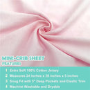 Fitted mini crib sheet in baby pink, made of 100% cotton jersey, with deep pockets and elastic trim for snug fit.