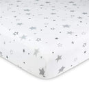 Fitted crib sheet featuring a white background with various silver stars in different styles and sizes.
