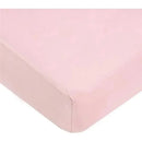 Fitted crib sheet in soft pink cotton jersey knit fabric, designed for a snug fit on standard crib mattresses.