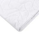 Waterproof mattress protector for Pack N Play, featuring a quilted white surface and rounded corners.