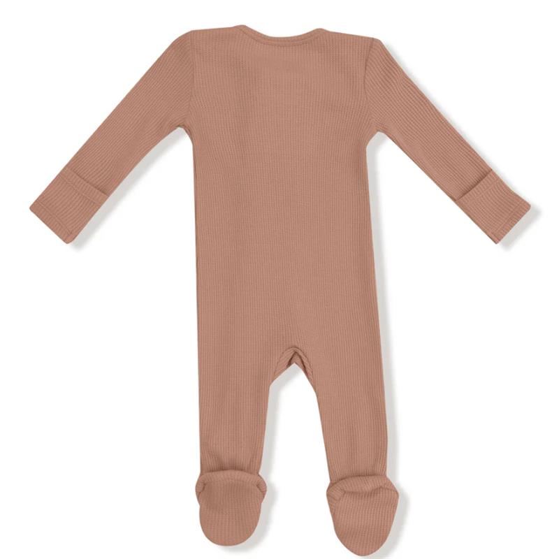 Baby Basics Cafe Au Lait 2 Way Zipper Footie in ribbed fabric, featuring long sleeves and enclosed feet in a soft beige color.