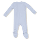Light blue, ribbed baby footie with long sleeves, 2-way zipper, and polka dot grips on the feet.