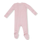 Light pink long-sleeve footie for babies with a two-way zipper and polka dot foot grips.