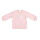 Pink oversized sweatshirt for baby girls, featuring an embroidered bow design on the front.
